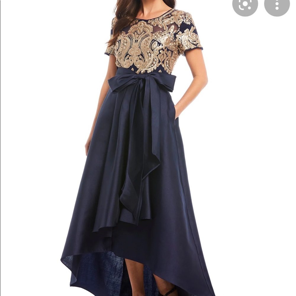 As seen on The Knot, Davids Bridals and Dillards.  Navy and Gold hi/low dress